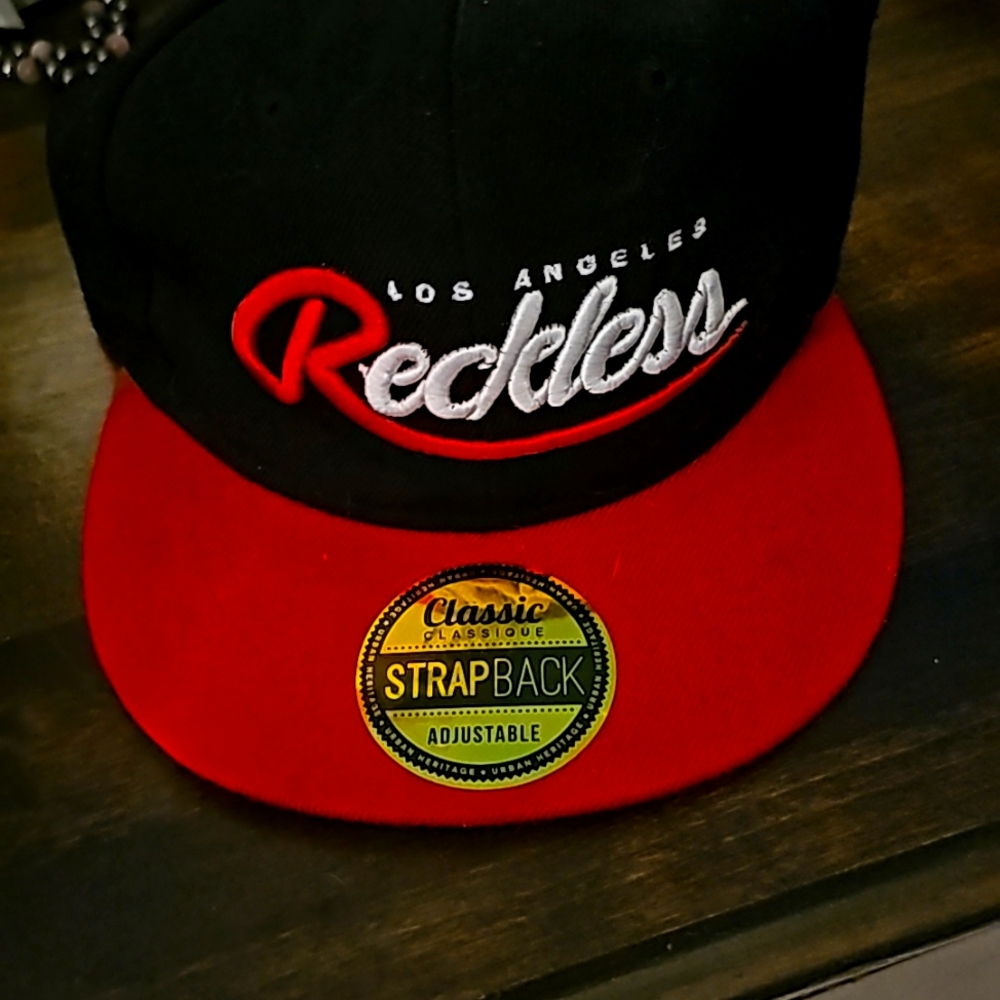 Young and Reckless mens snap back hat